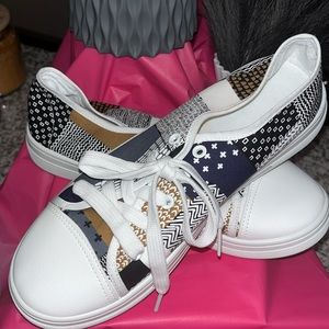 Canvas sneakers, fun white base.